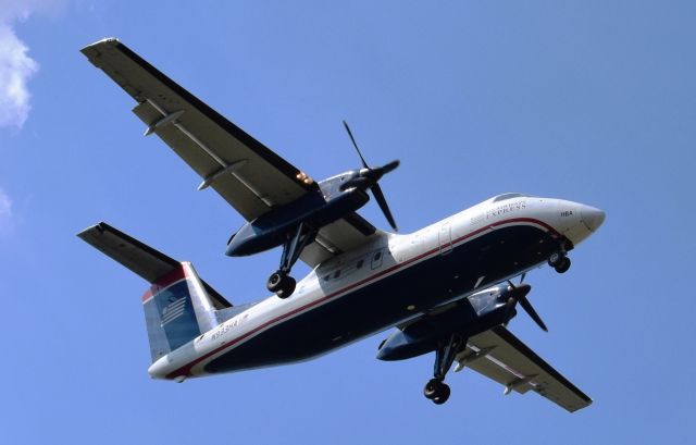 de Havilland Dash 8-100 (N933HA) - A U.S. Airways Express Dash-8 Q100 pictured just before landing on runway 35 at Philadelphia International Airport. Picture taken on July 23rd, 2016 from the threshold of runway 35.