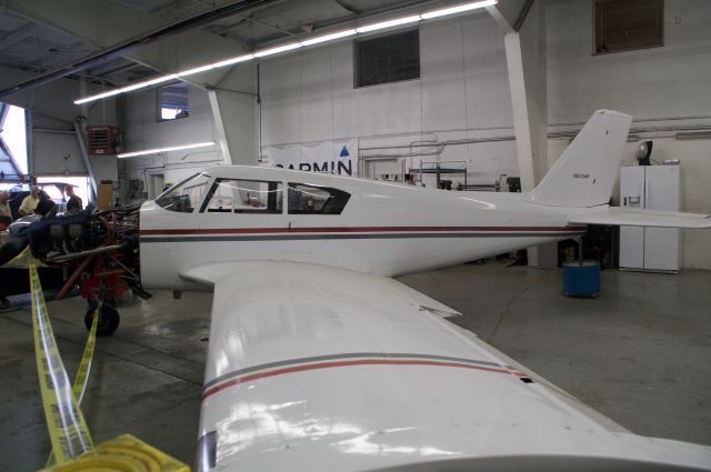 Piper PA-24 Comanche (N6334P) - A comanche in the maintenance hangar during the meet and greet with the candy bomber and dick cole.