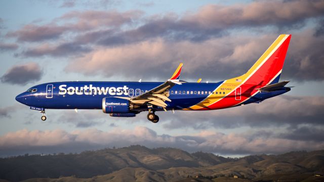 Boeing 737 MAX 8 (N8726H) - Southwest B38M on short final for KSJC amid rolling green hills and a colorful, cloudy sky