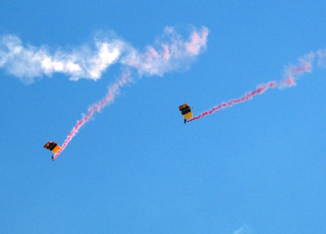 — — - U.S. Army sky divers over NHRA drag racing finals, Pomona, CA
