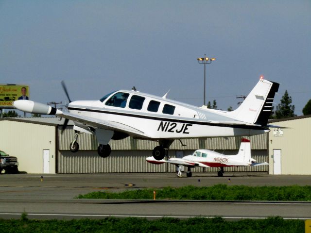 Beechcraft Bonanza (36) (N12JE) - Taking off RWY 24