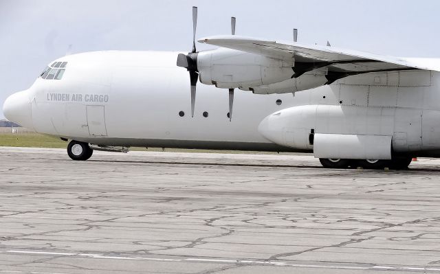 Lockheed C-130 Hercules (P4-LAS) - Lynden Air Cargo sitting at Willow Run. After blowing a hydraulic seal after takeoff for its flight to Laredo, Texas. It had to return back to Willow Run after 20 minutes in the air.