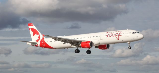 Airbus A321 (C-FYXF) - Landing at Miami International on the afternoon of the 19th of December, 2018.  