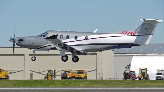 Pilatus PC-12 (N79NG) - A Pilatus PC-12/47E (Ser#1379) nearing touchdown on runway 34L on 5/1/13.