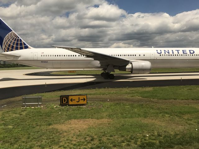 BOEING 767-400 (N76064) - From my plane after landing.