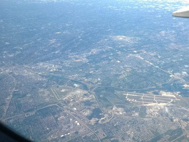 Airbus A319 (N854UA) - On the way from IAH/KIAH to CLE/KCLE, from FL350, from left to right, City of Dayton, OH, Wright Field, and Wright-Patterson AFB.