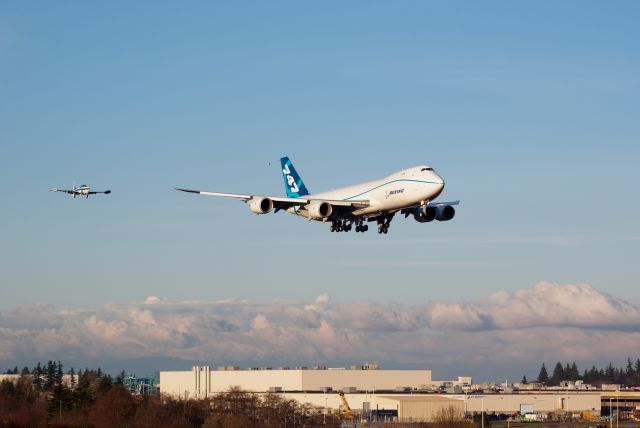 Boeing 747-200 (N747EX) - First approach after first flight. Note T-33 chase plane on right wing