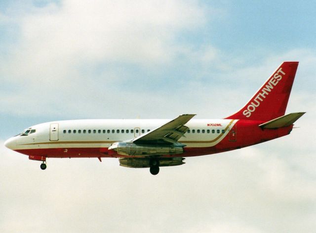 Boeing 737-200 (N702ML) - Scanned from postcardbr /Southwest Airlines leased from midway airlines