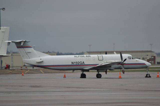 Beechcraft 1900 (N192GA) - N192GA sitting on the East GA tarmac in KFSD