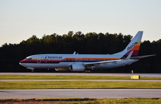 Boeing 737-800 (N917NN) - A RARE sight.  Not so much AirCal - which is rare, too - but being able to photograph at RDU on the taxiway.  The Collings Foundation had a fly-in on 10/19/17 - we were allowed in the DOT hangar.  It may have been evening, so its a little backlit, but what a privilege!