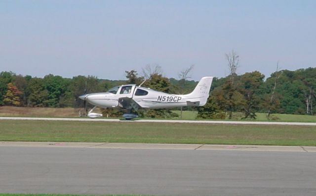 Cirrus SR-22 (N519CP) - Taxiing off of RWY 09 on 10/11/09