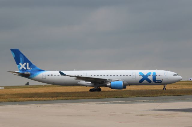 Airbus A330-300 (F-HXLF) - XL Airways France (SE) F-HXLF A330-303 [cn1360]br /Paris Charles de Gaulle (CDG). XL Airways flight SE31 taxis to the gate on arrival from New York Kennedy (JFK).  br /Taken from Terminal 1 arrivals level.br /2018 08 09br /a rel=nofollow href=http://alphayankee.smugmug.com/Airlines-and-Airliners-Portfolio/Airlines/EuropeanAirlines/XL-Airways-SE/https://alphayankee.smugmug.com/Airlines-and-Airliners-Portfolio/Airlines/EuropeanAirlines/XL-Airways-SE//a