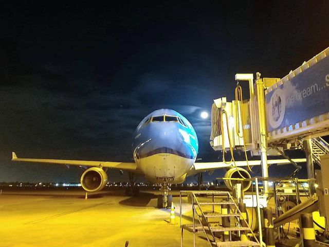 PH-AKB — - Parked at Gate 5 with the moonlight Setting. Overnight