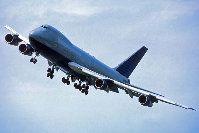 Boeing 747-200 (N152UA) - Former United Boeing 747-222B N152UA at Air Force Plant 42 in Palmdale, California on August 26, 1999. It first flew on March 1, 1987. Its construction number is 23737. It was delivered to United on April 2, 1987. Northwest registered it as N645NW on July 3, 2000. It was merged into the Delta fleet on October 29, 2008. Kalitta Air acquired it on August 19, 2010 and registered it as N739CK on November 3, 2010. The Cargo Airline registered it as 4L-GEL on June 9, 2017.