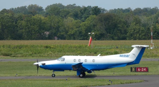 Pilatus PC-12 (N691AF) - Taxiing for a departure is this Cobalt Air 2017 Pilatus PC-12/47E in the Summer of 2023.