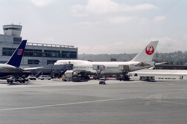 Boeing 747-400 (JA8902) - KSFO - early 2000 at SFO - unsure why the UAL 767 was at these gates, but so much has changed at SFO since year 2000. date apprx.