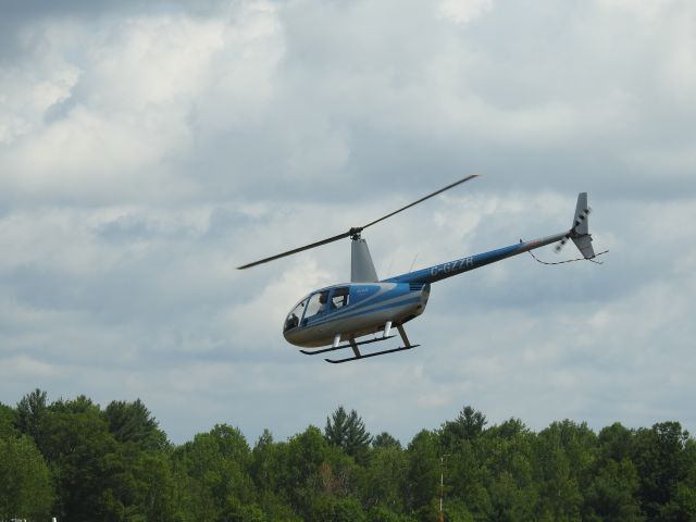 — — - Robertson R44 on take off at Muskoka CYQA Canada