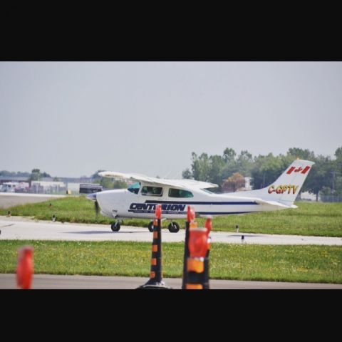 Cessna Centurion (C-GPTV) - A Cessna 210 taxing at "Windsor International Airport".