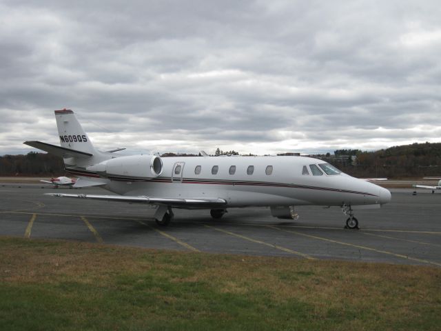 Cessna Citation Excel/XLS (EJA609) - Sitting under a gray sky after arriving from Sarasota, FL (KSRQ).