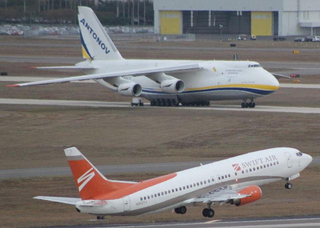 BOEING 737-400 (N802TJ) - Swift 737-400 blasting out of Tampa in front of the Antonov AN124 during a very cold Florida winter!!