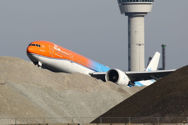 BOEING 777-300ER (PH-BVA) - behind the constructionwork the 777 just lifting off underway to Lima