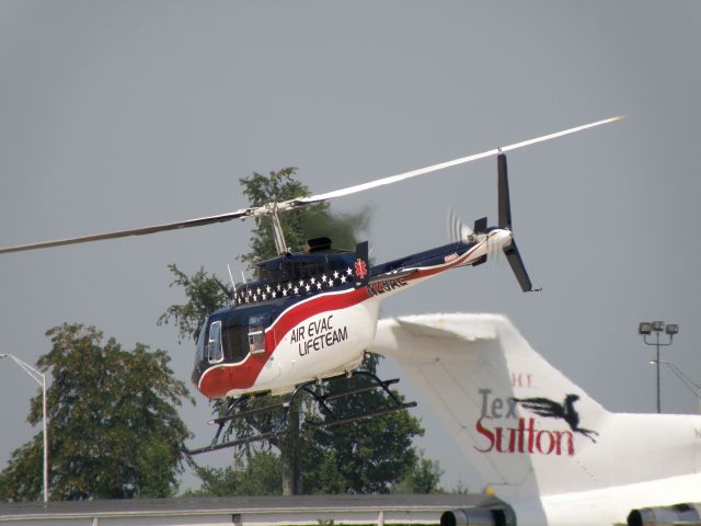 Bell TwinRanger (N29AE) - Air Evac Lifeteam 14 (N29AE) leaving the ramp at TAC Air, the FBO at Blue Grass Airport (KLEX), heading northbound with a patient onboard... AE 14 is based at Albany, KY....