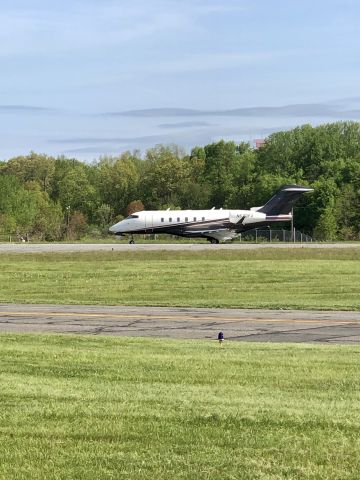Canadair Challenger 350 (N570FX) - Flexjet Challenger 350 back-taxing on Runway 11, soon to depart towards Denver Centennial APA.  The main runway 34/16 is currently closed for repaving.  