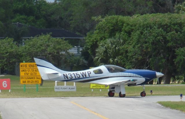 Lancair Legacy 2000 (N315WP) - N315WP departing Spruce Creek.