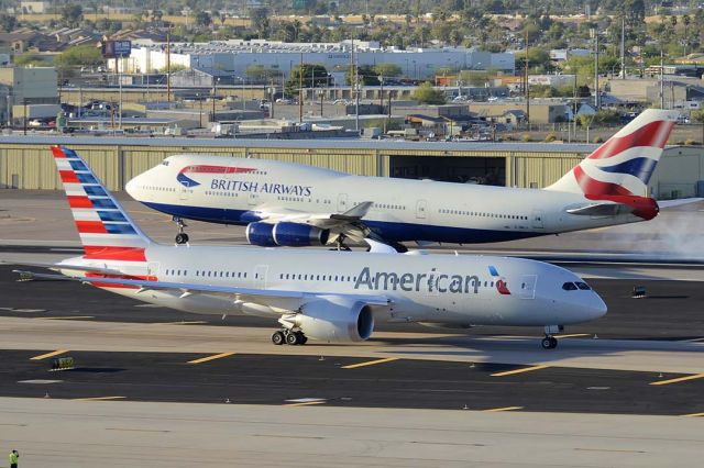 Boeing 747-400 (G-BNLX) - British Airways Boeing 747-436 G-BNLX landing on Runway 26, next to American Boeing 787-823 N801AC at Phoenix Sky Harbor on March 10, 2015.