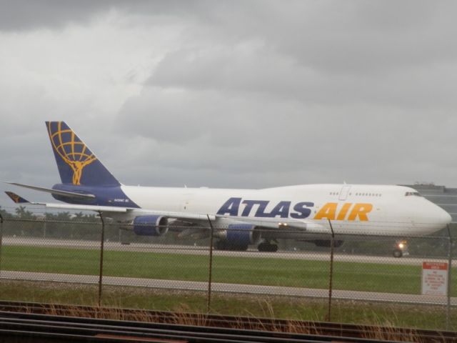 Boeing 747-400 (N429MC) - Taking-off in a rainstorm!