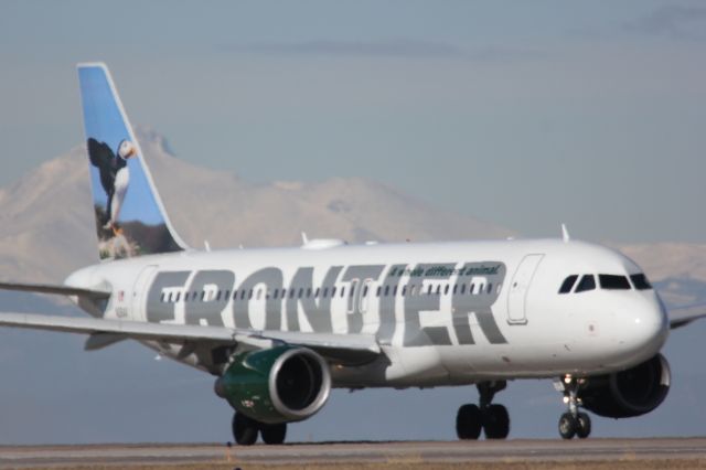 Airbus A320 (N261AV) - Longs Peak in the background...taking off on runway 8 at DIA.