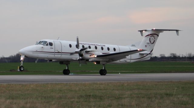 Beechcraft 1900 (N193CZ) - A Beechcraft 1900C at dusk as right main gear touches down on Runway 36 at Pryor Field Regional Airport, Decatur, AL - February 14, 2017.