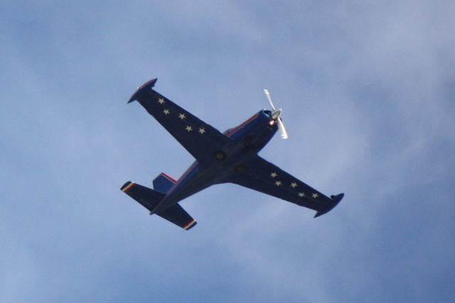 SIAI-MARCHETTI Warrior (N66FD) - SIAI Marchetti SF-260 (N66FD) flies over Sarasota-Bradenton International Airport