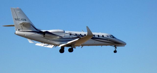 Cessna Citation Excel/XLS (N824DM) - About to touch down is this 2011 Cessna 560XL CItation XLS+ in the Winter of 2025.
