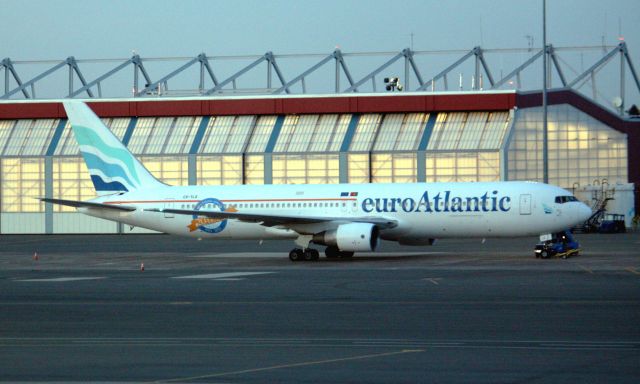 BOEING 767-300 (CS-TLO) - Euroatlantic B767-300 (CS-TLO) wearing 20 years 1993-2013 sticker at dusk.