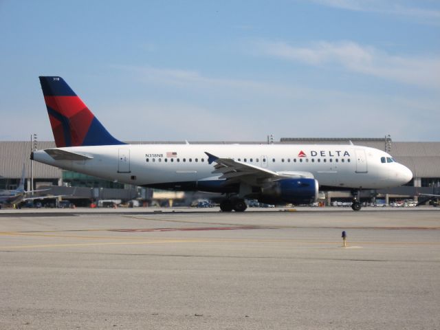 Airbus A319 (N318NB) - Holding on RWY 19R