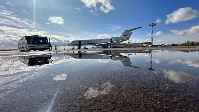 Gulfstream Aerospace Gulfstream V (N95NA) - NASA's GV reflects on a fresh rain puddle at the tarmac of Karaganda, Kazakhstan on 23 September 2023. It has arrived to be in position for the upcoming Soyuz landing of record-setting U.S. astronaut, Frank Rubio.