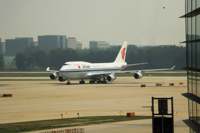 BOEING 747-8 (B-2447) - 6/23/18 turning on to taxiway T2 from Y4