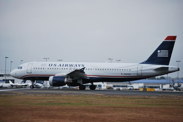 Airbus A320 (N107US) - In position 18L - 10/23/09