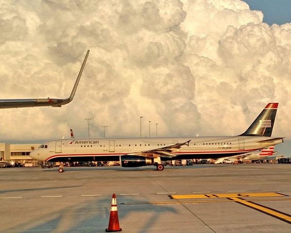 Airbus A321 (N578UW) - U.S Airways retro jet with a huge cloud behind!