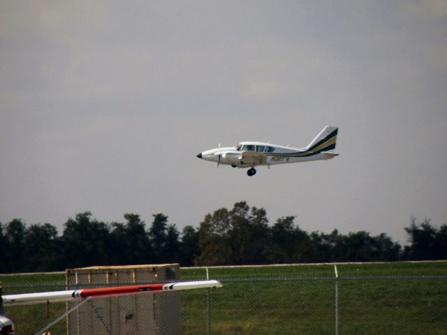 Piper Aztec (N31TV) - An easy-to-spot Piper Aztec (N31TV), en route to University-Oxford (MS) Airport(KUOX), just off RWY 22 at Blue Grass Airport (KLEX)...