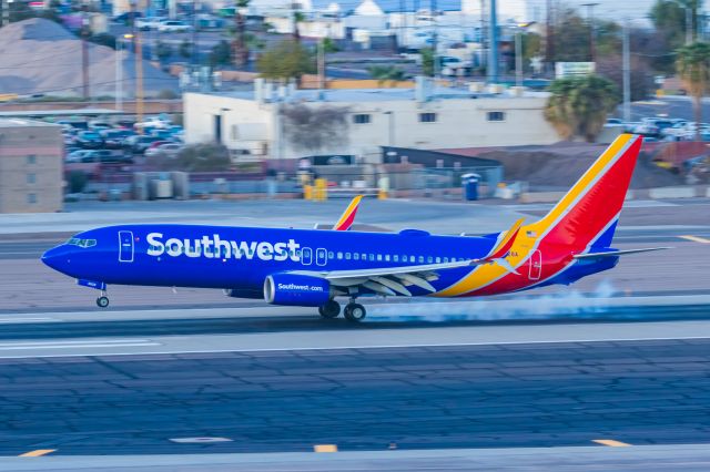 Boeing 737-800 (N8628A) - A Southwest Airlines 737-800 landing at PHX on 2/12/23 during the Super Bowl rush. Taken with a Canon R7 and Canon EF 100-400 II L lens.