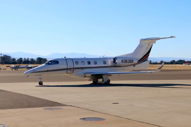 Embraer Phenom 300 (N363QS) - KRDD - EMB-505 at the Redding Jet Center June 30th, 2018 basking in the warm Am sunlight ready for the next flight.