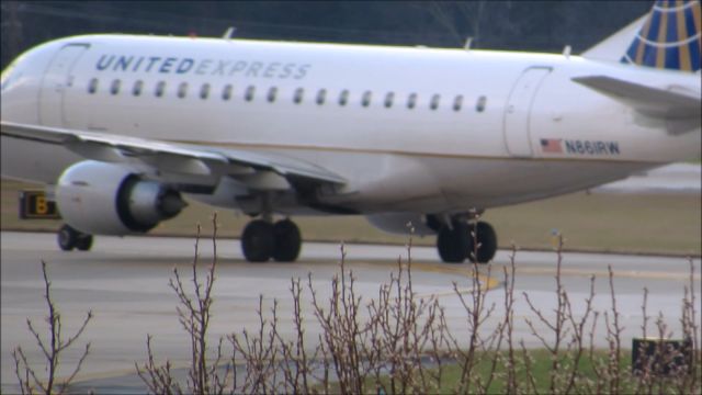 Embraer 170/175 (N861RW) - A United Express Embraer 170 landing at Raleigh-Durham Intl. Airport. This was taken from the observation deck on January 17, 2016 at 4:35 PM. This is flight 3526 from ORD.