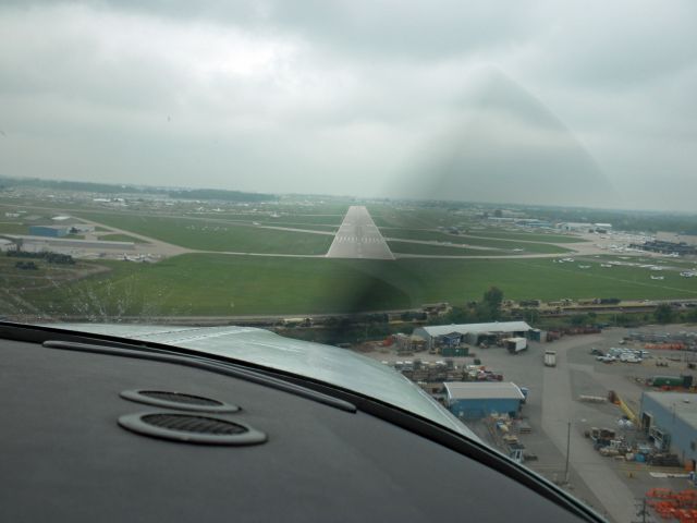 Beechcraft Bonanza (33) (N1854X) - Arriving runway 27 OSH on Saturday 7/31/10