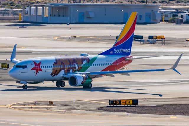 Boeing 737-700 (N943WN) - A Southwest 737-700 in California One special livery taxiing at PHX on 2/12/23 during the Super Bowl rush. Taken with a Canon R7 and Canon EF 100-400 II L lens.