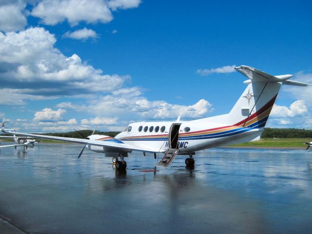 Beechcraft Super King Air 300 (N300MC) - King Air 300 at Norwood, Massachusetts After Rain Shower. June 8, 2010