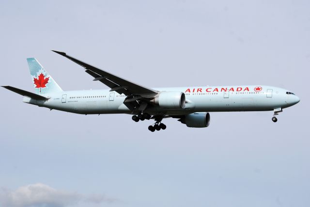 BOEING 777-300 (C-FNNU) - Taken from the threshold of 09L