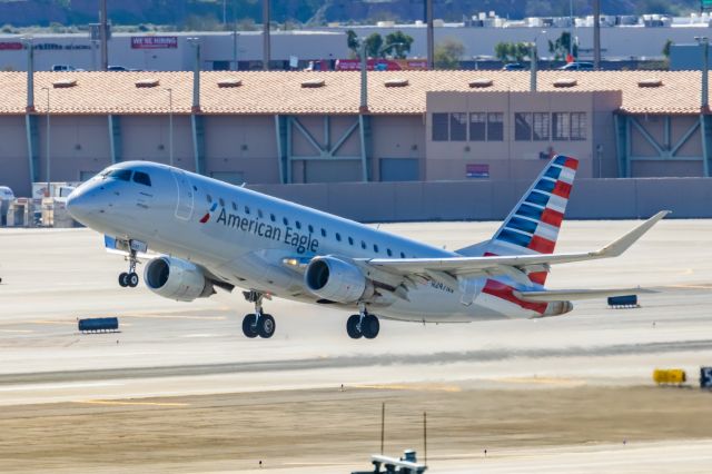 Embraer 175 (N247NN) - An American Eagle ERJ175 taking off from PHX on 2/11/23 during the Super Bowl rush. Taken with a Canon R7 and Canon EF 100-400 II L lens.