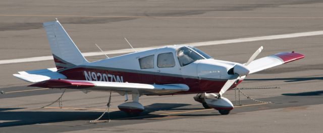 Piper Cherokee (N9207W) - Parked near El Aero on the northwest side of the airport at Carson City